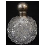 1154	ANTIQUE CUT GLASS PERFUME BOTTLE WITH HALL MARKED SILVER LID AND COLLAR, APPROXIMATELY 5 1/2 IN