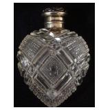 1172	HEART SHAPED CUT GLASS AND REPOUSSE STERLING LID LADIES SCENT PERFUME BOTTLE APPROXIMATELY 4 IN