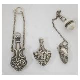 1184	3 REPOUSSE SILVER LADIES SCENT PERFUMES, 1 WITH ENAMEL PIN CLASP, LARGEST APPROXIMATELY 2 1/4 I