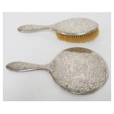 1191	STERLING SILVER LADIES DRESSER MIRROR AND HAIR BRUSH