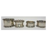 1205	GROUP OF 4 STERLING NAPKIN RINGS, 3.8 OZT