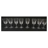 1002	WATERFORD CRYSTAL 8 WINES, EACH APPROXIMATELY 7 IN HIGH