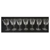 1003	WATERFORD CRYSTAL 7 WINES, EACH APPROXIMATELY 6 IN HIGH