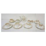1041	GROUP OF ASSORTED ANTIQUE FRENCH PORCELAIN GILT DECORATED CUPS & SAUCERS, TEAPOT, LARGEST PIECE