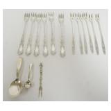 1091	GROUP OF ASSORTED SILVER PLATE SPOONS AND SEA FOOD FORKS