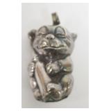 1094	STERLING SILVER PUPPY HUGGING A BOTTLE BABY RATTLE, .67 OZT