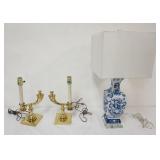 1190	PAIR OF BRASS ALADIN STYLE TABLE LAMPS AND BULE & WHITE PORCELAIN LAMP ON LUCITE BASE, LARGEST 