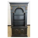 1201	2 PART NEO CLASSICAL STYLE BOOKCASE IN EBONIZED FINISH WITH REEDED COLUMN SIDES, ARCHED TOP AND