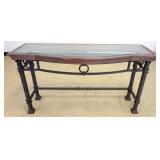 1212	GLASS TOP CONSOLE TABLE ON WROUGHT METAL BASE, APPROXIMATELY 60 IN X 20 IN X 34 IN H