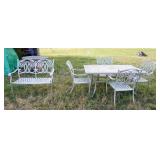 1293	CAST METAL PATIO SET, TABLE WITH 4 ARM CHAIRS AND BENCH