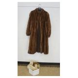 1148	TURECK PELS MINK COAT MARKED SAGA SELECTED MINK, APPROXIMATE SIZE 10-12 AND 4 FUR COLLARS