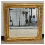 1224	JA OLSEN BEVELED EDGE MIRROR IN GILT FRAME, APPROXIMATELY 39 IN X 39 IN