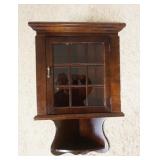 1243	MAHOGANY HANGING CORNER CURIO CABINET, APPROXIMATELY 20 IN X 10 IN X 32 IN H