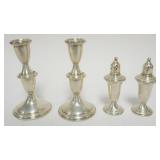 1010	STERLING SILVER WEIGHTED CANDLE STICKS AND SALT/PEPPER SHAKERS, TALLEST APPROXIMATELY 6 IN H