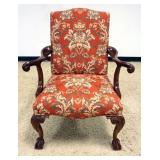 1218	SOUTHWOOD UPHOLSTERED ARM CHAIR WITH CARVED CABRIOLE AND BALL & CLAW FEET, APPROXIMATELY 32 IN 