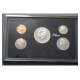 1165	UNITED STATES MINT PROOF SET WITH SILVER DOLLAR, QUARTER & DIME