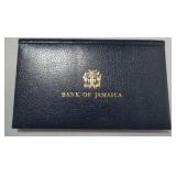 1169	1976 BANK OF JAMAICA BANK NOTE SET, LTD ED FOLDER SN 0094  TWO DIGIT VERY LOW SERIAL NUMBER