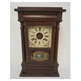 1177	ANTIQUE SHELF CLOCK W/TURNED COLUMNS & REVERSE PAINTED GLASS DOOR, APPROXIMATELY 16 IN X 5 IN X