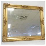 1207	BEVELED EDGE WALL MIRROR IN GILT FRAME, APPROXIMATELY 31 IN X 37 IN