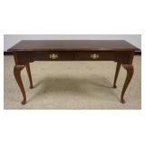 1219	2 DRAWER SOFA TABLE WITH CABRIOLE LEGS, SOME SUN FADING TO TOP FINISH, APPROXIMATELY 54 IN X 17
