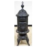 1233	THE KEELY STOVE CO. CAST IRON STOVE, APPROXIMATELY 16 IN X 47 IN H