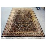 1243	PERSIAN STYLE RUG, APPROXIMATELY 6 FT X 9 FT
