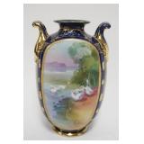 1025	HAND PAINTED NIPPON DOUBLE HANDLED VASE, APPROXIMATELY 9 IN HIGH