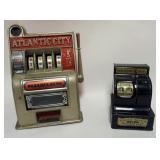 1124	VINTAGE CAST METAL ATLANTIC CITY SLOT MACHINE BANK AND UNCLE SAMS CASH REGISTER BANK, LARGEST A