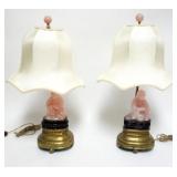 1036	PAIR OF ASIAN TABLE LAMPS WITH ROSE QUARTZ CARVED FIGURES IN CENTER ON WOOD STANDS, SOME LOSS T