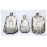 1063	3 STERLING SILVER SCENT PERFUME BOTTLES, TALLEST APPROXIMATELY 2 IN