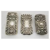 1069	GROUP OF 3 REPOUSSE STERLING MATCH SAFES, 1.4 OZT