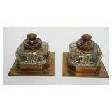 1103	PAIR OF GLASS INKWELLS IN SOLID BRASS BASES, EACH APPROXIMATELY 3 3/4 IN SQUARE X 3 1/4 IN HIGH