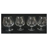 1128	4 STEUBEN BRANDY SNIFTERS, APPROXIMATELY 6 1/4 IN HIGH