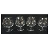 1129	4 STEUBEN BRANDY SNIFTERS, APPROXIMATELY 6 1/4 IN HIGH