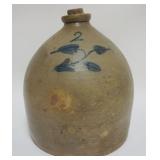 1005	BLUE DECORATED STONEWARE 2 GAL JUG, APPROXIMATELY 12 IN H