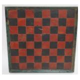 1018	PRIMITIVE FOLK ART HAND PAINTED CHECKERBOARD WITH APPLIED MOLDED BORDER, APPROXIMATELY 13 IN SQ