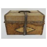 1025	HIDE COVERED BOX WITH BRASS TACK ACCENTS, LEATHER STRAP AND WALLPAPER INTERIOR