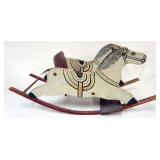 1101	PAINT DECORATED CHILDS WOOD ROCKING HORSE, APPROXIMATELY 36 IN X 12 IN X 17 IN H