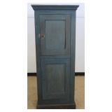 1189	NARROW 2 DOOR CHIMNEY CUPBOARD ON BRACKET FEET IN BLUE PAINT FINISH, APPROXIMATELY 27 IN X 17 I
