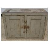 1213	PRIMITIVE 2 DOOR CUPBOARD WITH INTERIOR PIGEON HOLES, APPROXIMATELY 33 IN X 14 IN X 25 IN H