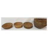 1256	GROUP OF RYE GRASS BASKETS, LOSS TO LARGEST ONE, LARGEST APPROXIMATELY 16 IN X 12 IN HIGH