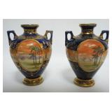 1044	PAIR OF HAND PAINTED MORIAGE DOUBLE HANDLED VASES, APPROXIMATELY 8 1/2 IN HIGH