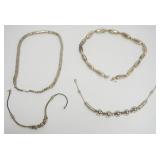 1052	ASSORTMENT OF 4 LADIES SILVER TONE NECKLACES