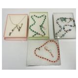 1056	ASSORTMENT OF 4 LADIES COSTUME NECKLACE AND EARRING SETS, INCLUDING SILVER TONE, MOTHER OF PEAR
