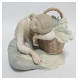 1131	LLADRO FIGURINE, GIRL SLEEPING BY BASKET, APPROXIMATELY 6 IN HIGH