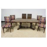 1179	DOUBLE PEDESTAL DINING TABLE W/4 UPHOLSTERED SIDE CHAIRS & 2 LEAVES, TABLE TOP HAS DARK GOUGE, 
