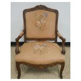 1219	VINTAGE UPHOLSTERED ARM CHAIR IN CARVED FRAME, APPROXIMATELY 28 IN X 22 IN X 70 IN H