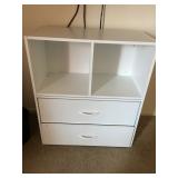 Small white cube with drawers