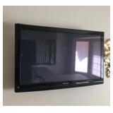 Panasonic TV w/wall bracket