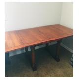 Vintage wood table with leaves folded it out